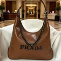Prada Bag | Triangle Stitch Leather Hobo Bag (with chain strap) – Brown (Cognac – Tan nappa leather with silver-tone metal logo lettering)