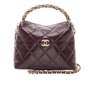 Chanel Bag | Hobo Bag In A Deep Burgundy, Quilted Leather With Gold-tone Hardware.