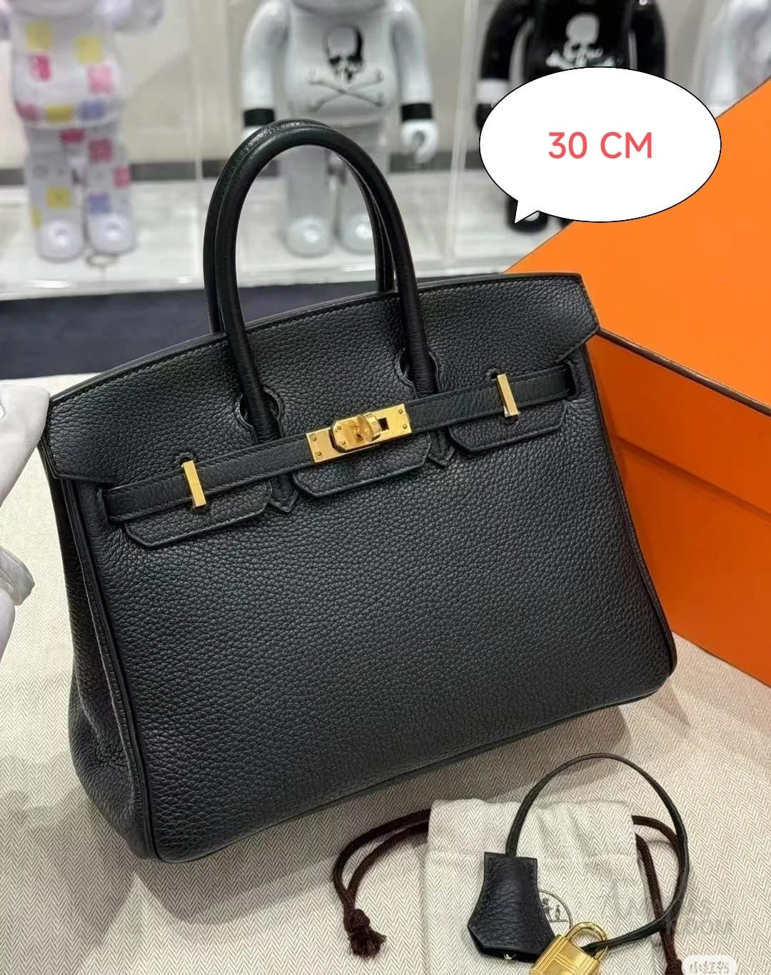 Hermès Birkin Bag 30 Handbag in Black Leather with Gold-plated Hardware – product view